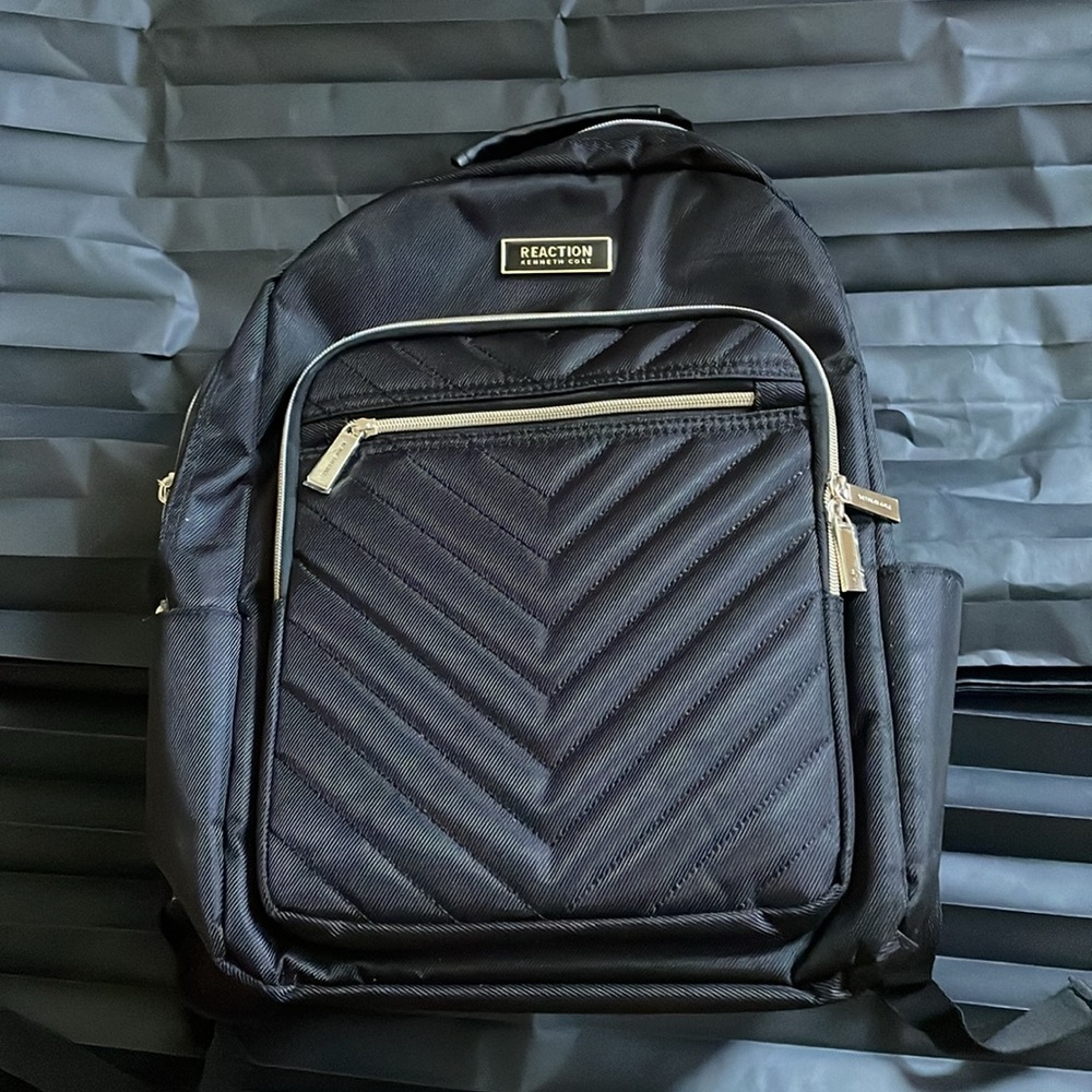 Kenneth Cole lap top backpack. Great for traveling and getting out.